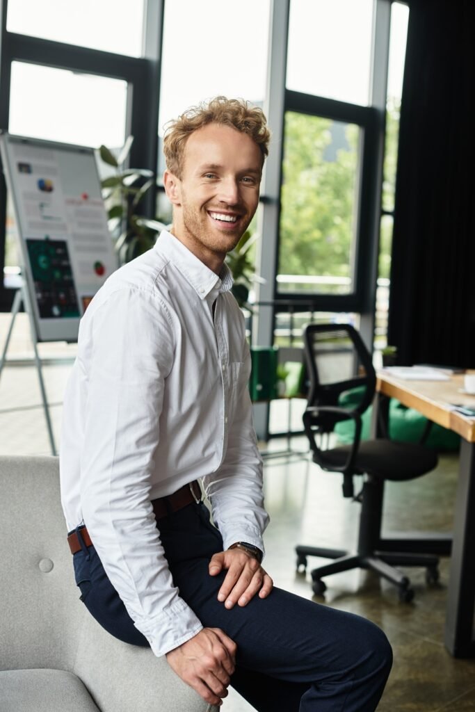 Redhead businessman in white shirt works on an innovative project in a modern office